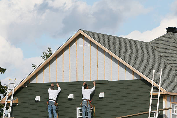 Professional Siding technician working in Naples, TX